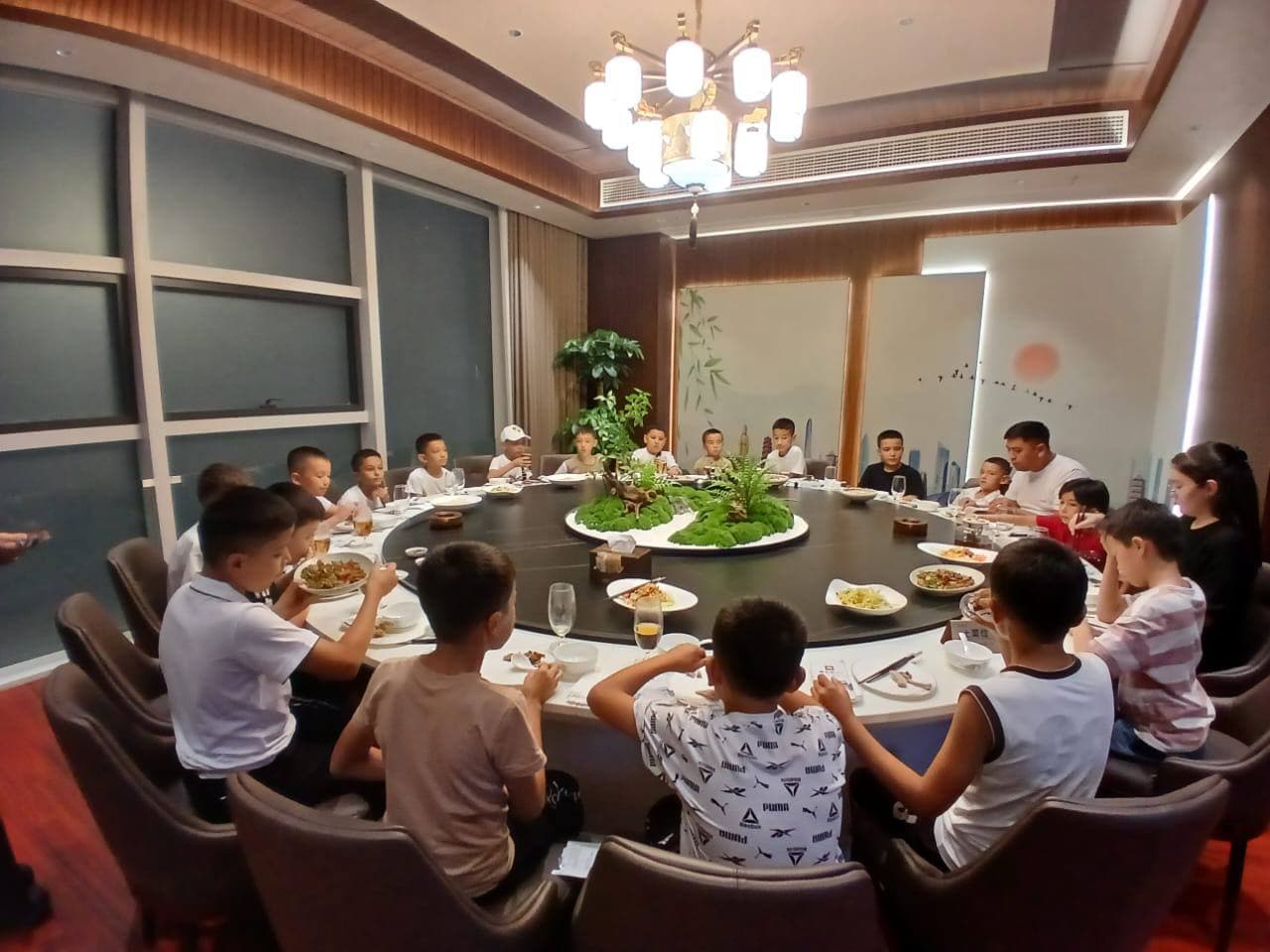 GATE participants sharing a group dinner around a banquet table